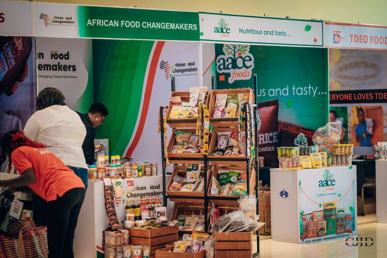 Packaged foods, spices and beverages on display at an African Food Changemakers exhibition stand